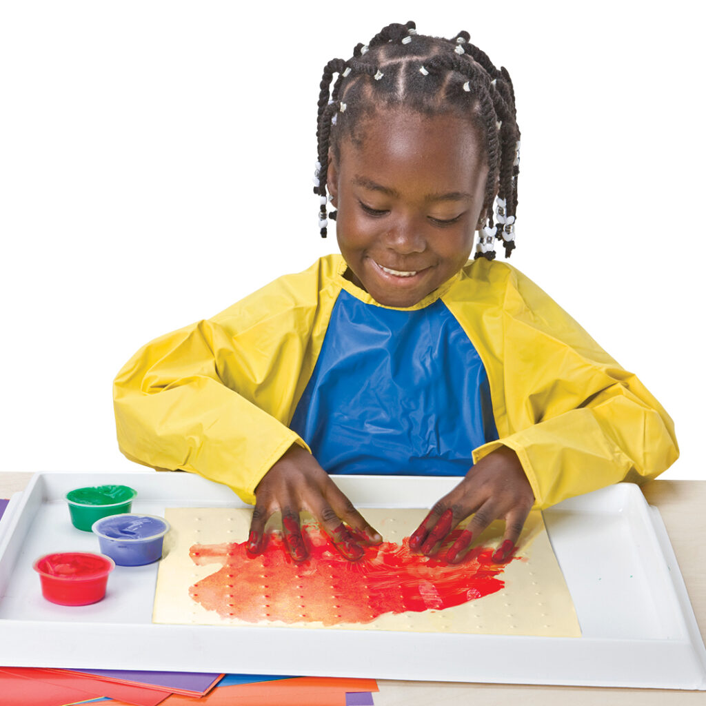 Girl using Roylco's Sensory Paper, Sensory Paper for Art Classrooms, Art Supplies for Toddlers