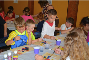 Children decorating Color Diffusing Hands with liquid water color