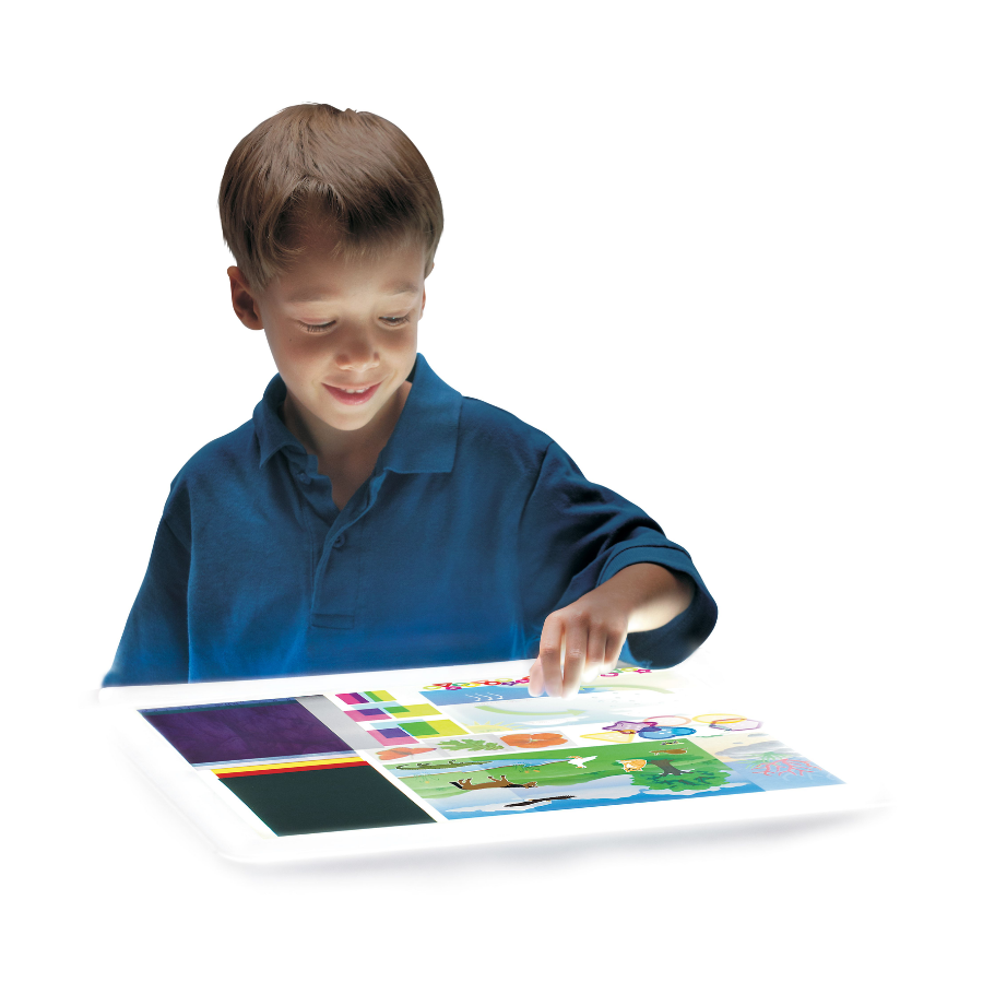 Roylco's first look light table, discover clues through light, boy using light table